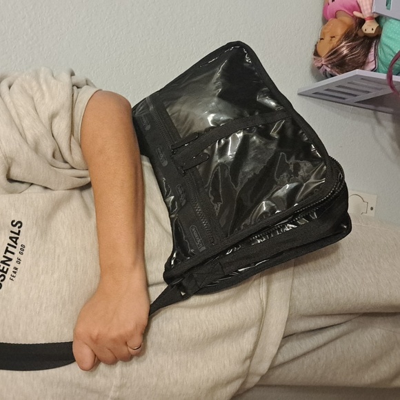 LeSportsac Deluxe Everyday Bag in a black shine or patent finish. - Picture 4 of 13